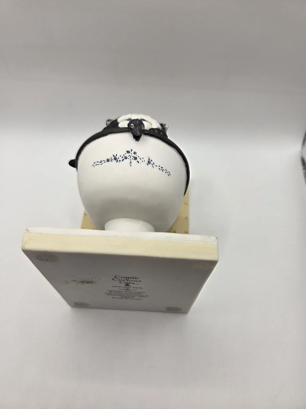 R200. Down The Pan Black and White Cat in Toilet Figurine